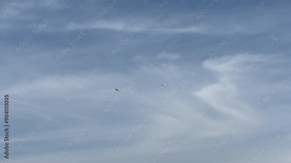 small passenger plane in flight tows a glider in the blue sky. High quality 4k footage small passenger plane in flight tows a glider in the blue sky. High quality 4k footage
