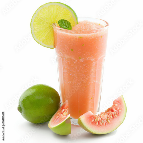 A refreshing freshly pressed guava smoothie with lime and honey, garnished with guava slices and a lime wedge, isolated on white background.