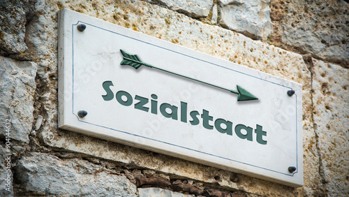 фотографія Signposts the direct way to welfare State