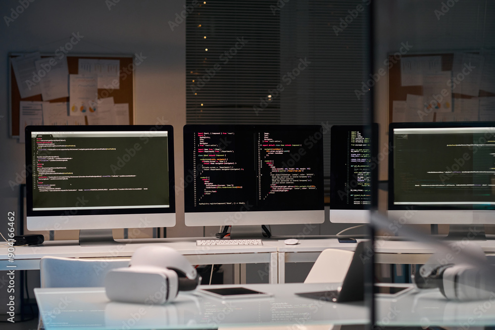 Naklejka premium Background image of three computer screens with code lines cybersecurity office, copy space