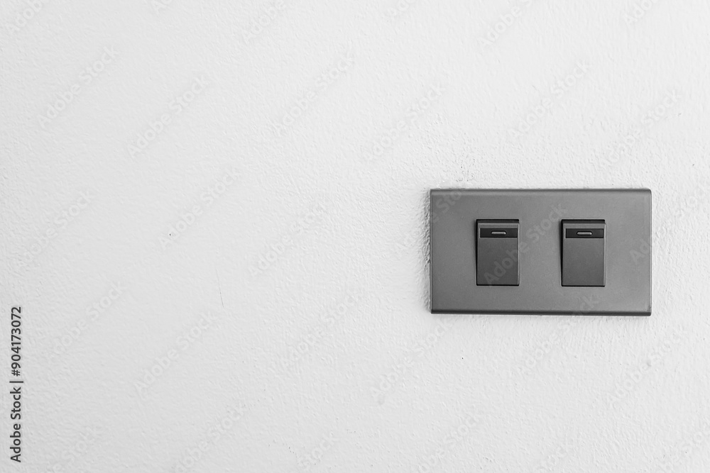 Beautiful clean white wall inside the room with a dark light power switch, Saving energy and save world concept. Beautiful clean white wall inside the room with a dark light power switch, Saving energy and save world concept.