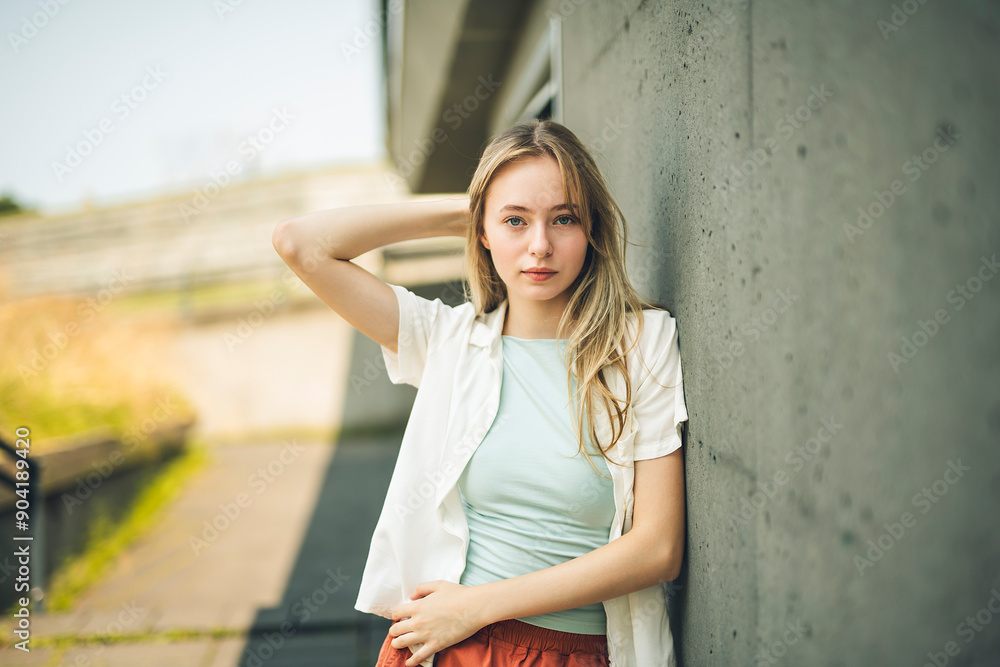 young woman on street, generation z girl posing outdoor backlit with sunlight, portrait. young woman on street, generation z girl posing outdoor backlit with sunlight, portrait.
