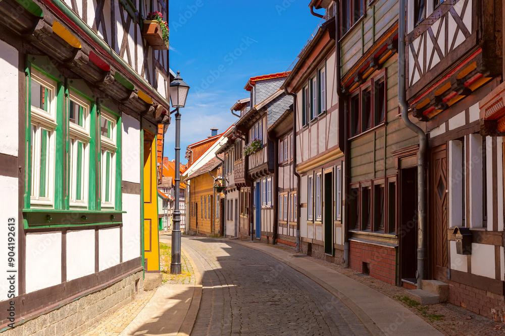 Medieval street with half-timbered houses in Wernigerode, Saxony-Anhalt, Germany Medieval street with half-timbered houses in Wernigerode, Saxony-Anhalt, Germany