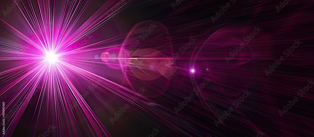 Pink lens flare on black backdrop creating an abstract optical ray ...