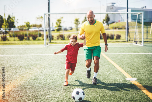 soccer, sport with a dad and daughter training on a court outside for leisure fitness and fun