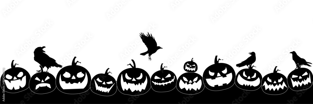 Fototapeta premium Halloween silhouette. Many different pumpkins carved for the holiday lie on the ground, crows fly around.Vector image