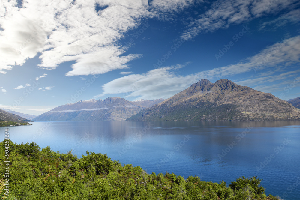 panoramic scenic view of Lake Wakatipu with mountains in the background near Queenstown, South Island, New Zealand panoramic scenic view of Lake Wakatipu with mountains in the background near Queenstown, South Island, New Zealand