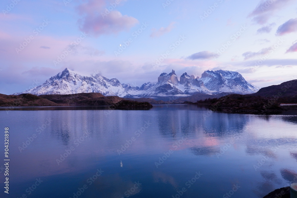 Sunrise at Cordillera Paine seen over Pehoé Lake, Torres del Paine National Park in Chilean Patagonia Sunrise at Cordillera Paine seen over Pehoé Lake, Torres del Paine National Park in Chilean Patagonia