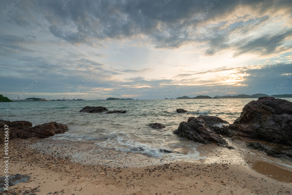 View of Sattahip bay at sunset time. Sattahip bay at sunset time with long exposure photo. View of Sattahip bay at sunset time. Sattahip bay at sunset time with long exposure photo.