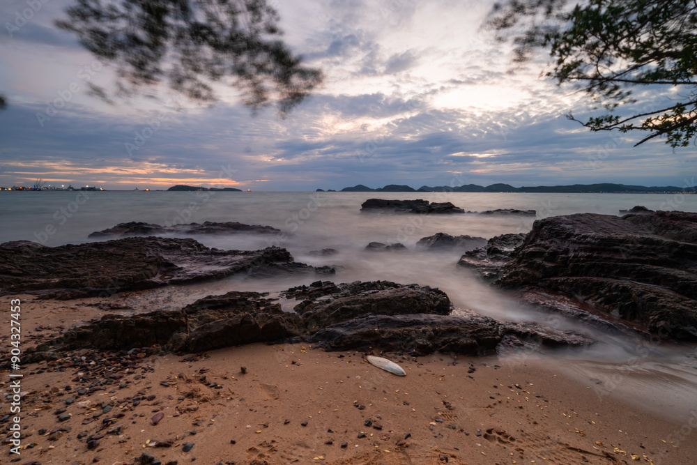 View of Sattahip bay at sunset time. Sattahip bay at sunset time with long exposure photo. View of Sattahip bay at sunset time. Sattahip bay at sunset time with long exposure photo.