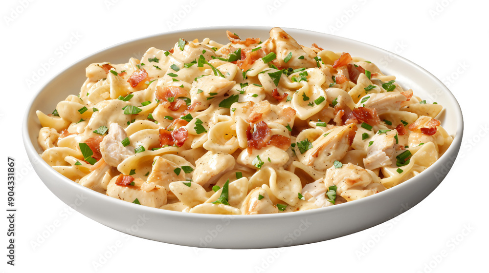 Tasty dish of creamy chicken pasta garnished with crunchy bacon and chopped parsley Tasty dish of creamy chicken pasta garnished with crunchy bacon and chopped parsley
