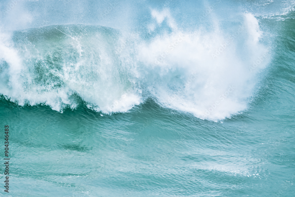 Wave splashing close-up. Crystal clear sea water, in the ocean in San Francisco Bay, blue water, pastel colors. Wave splashing close-up. Crystal clear sea water, in the ocean in San Francisco Bay, blue water, pastel colors.