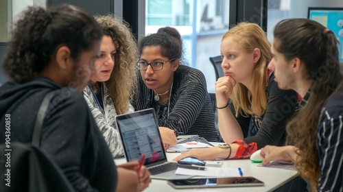 A group of interns learning from experienced colleagues