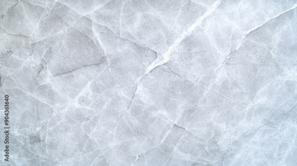 Top view of a polished white soapstone background with smooth texture and light grey swirls, perfect for background Top view of a polished white soapstone background with smooth texture and light grey swirls, perfect for background