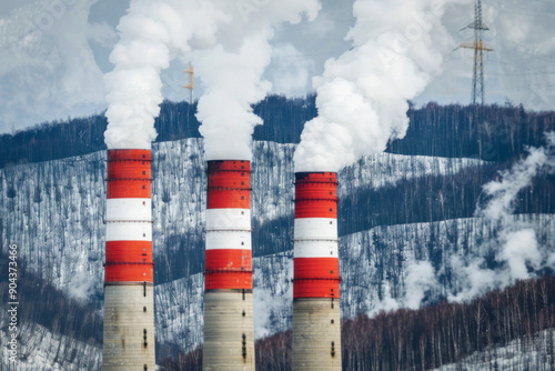 Three tall chimneys emittin...