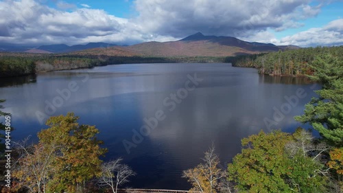 Aerial Autumn Drone Footage Reveals Rustic Bridge in Northern New England - Chocorua Lake - Tamworth, New Hampshire  photo