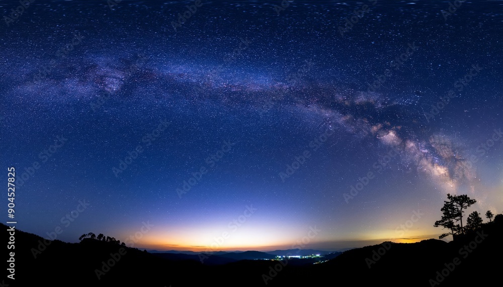 A majestic view of the Milky Way stretching across a starry night sky A majestic view of the Milky Way stretching across a starry night sky