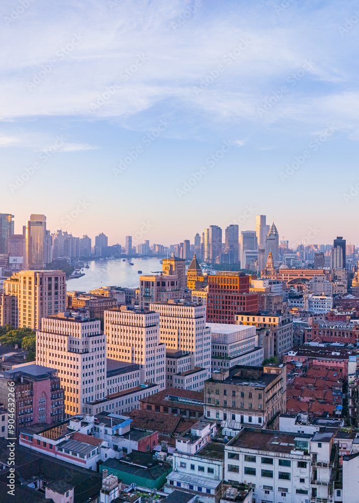 Fototapeta premium Aerial view of modern city skyline and buildings at sunrise in Shanghai.