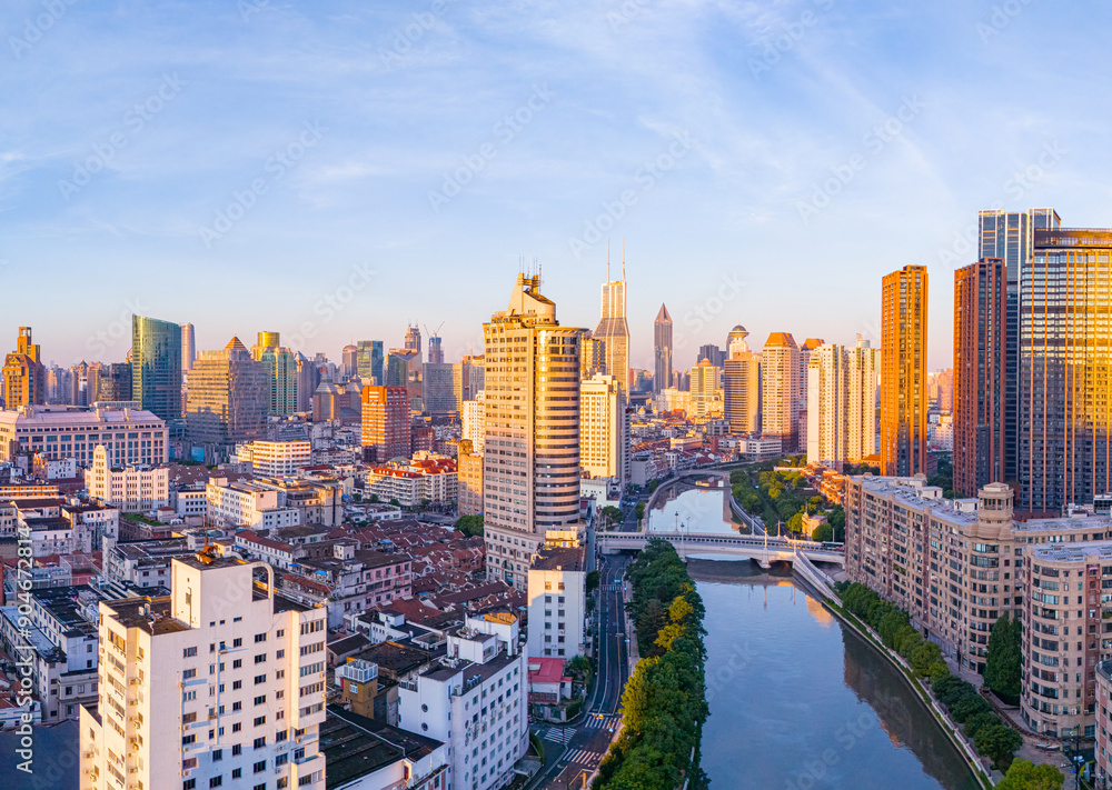 Obraz premium Aerial view of modern city skyline and buildings at sunrise in Shanghai.