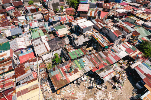 Aerial of densely packed and small shanty houses with shoddy construction at a squatter colony in Metro Manila. photo