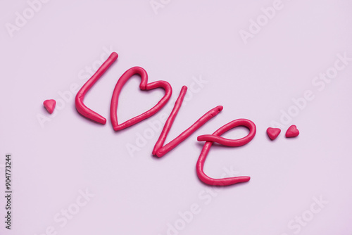 Word LOVE made of play doug...