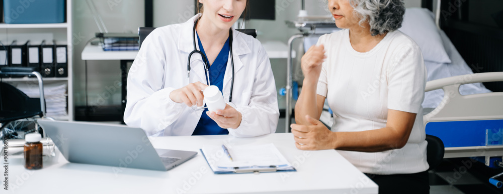 Senior woman being examined by a doctor in background Senior woman being examined by a doctor in background