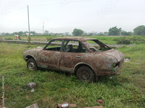 An old car that has become scrap without an engine.