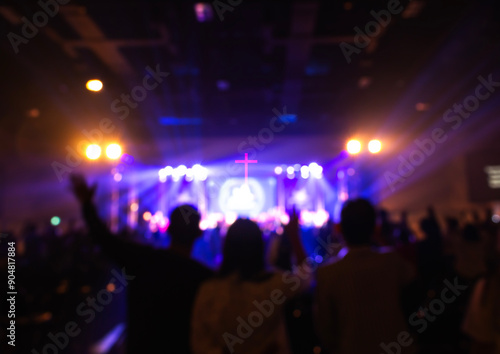 Obraz na plátne Blurred image of worship concert crowd in front of stage blurred background