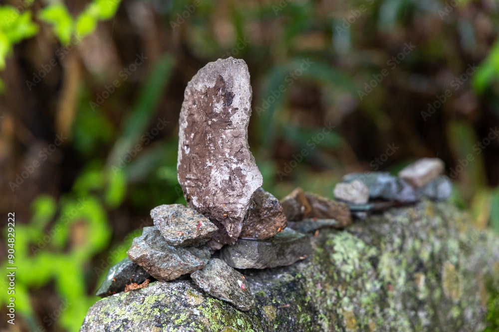 A small stone tower in the mountains A small stone tower in the mountains