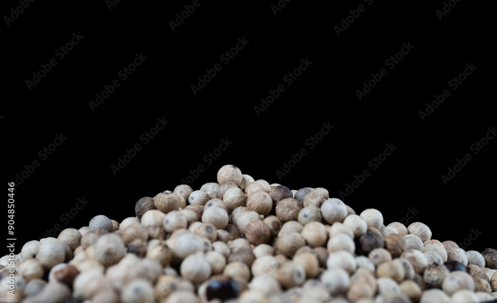 pile of coriander seeds isolated black background pile of coriander seeds isolated black background