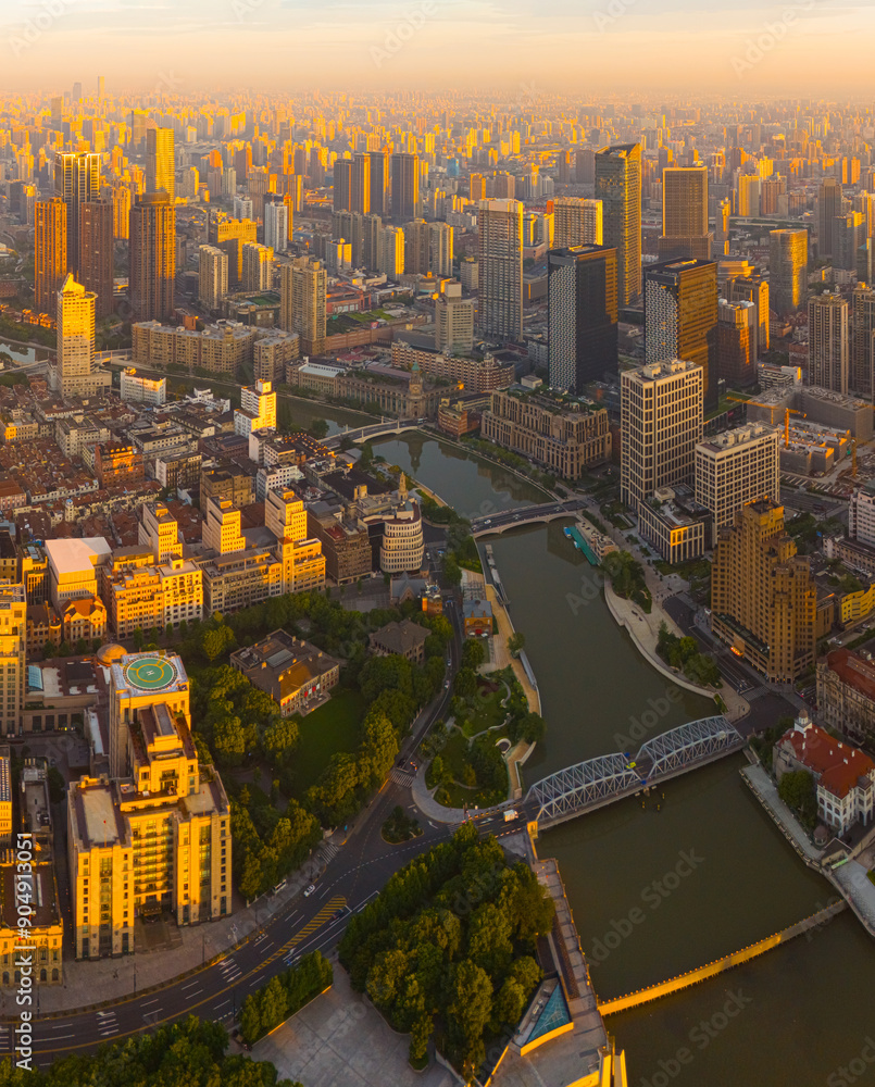 Obraz premium Aerial view of modern city skyline and buildings at sunrise in Shanghai.
