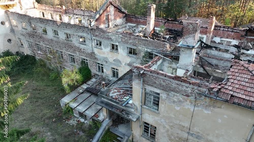 Ruined house. Ruined school building. Abandoned school in the forest