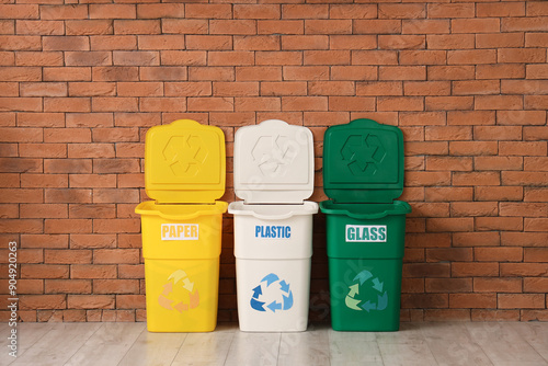 Empty trash bins for differ...