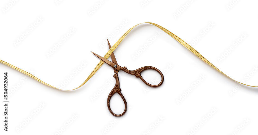 Golden ribbon with scissors on white background Golden ribbon with scissors on white background