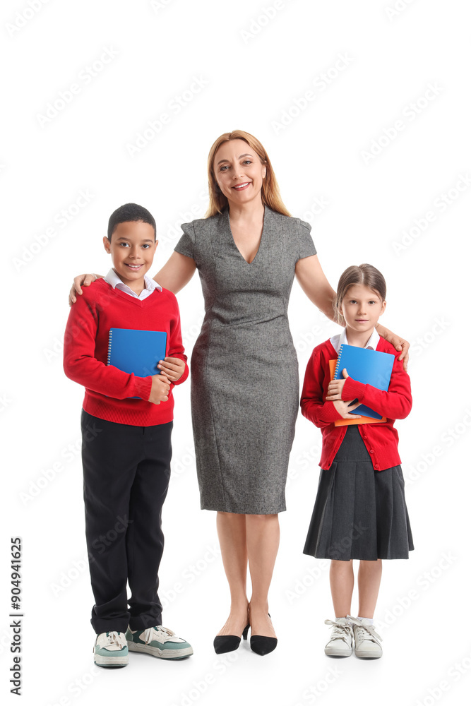 Mature teacher hugging little pupils on white background Mature teacher hugging little pupils on white background