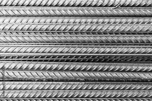 bars of steel reinforcement in close-up black white photo