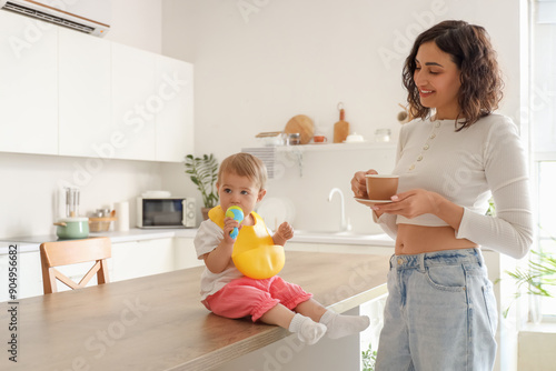 Cute little baby with nibbl...