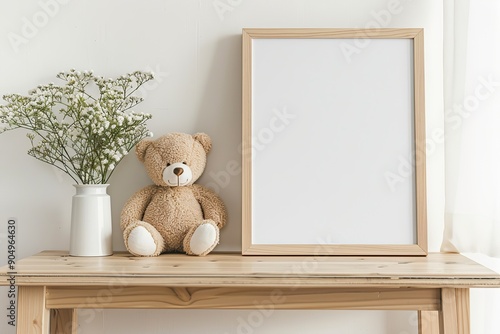 Blank white picture frame mockup in a bright simple childrens room interior. Eco friendly child wooden empty poster, toys white wall. Paper template and stylish scandinavian newborn cozy decoration.