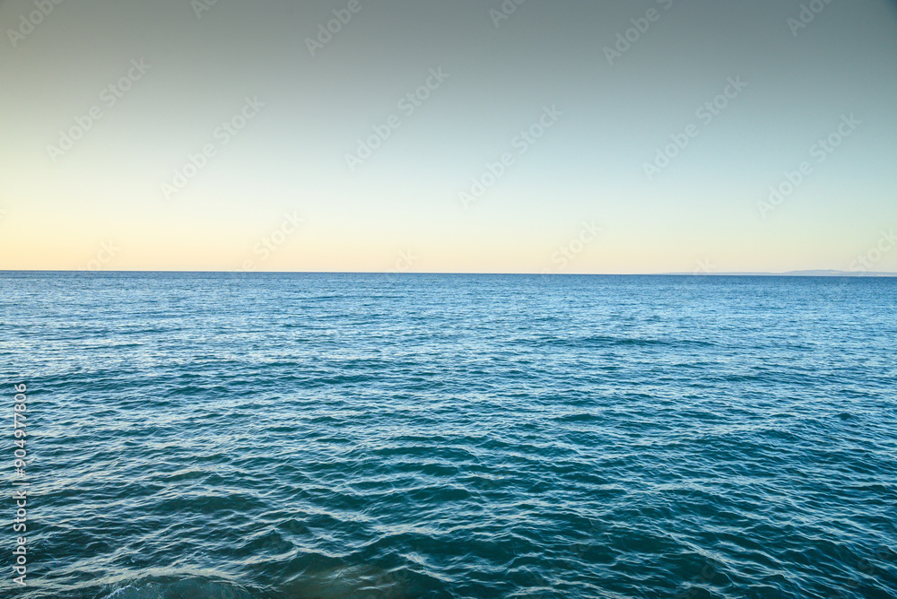 Obraz premium Blue sea water surface on sky