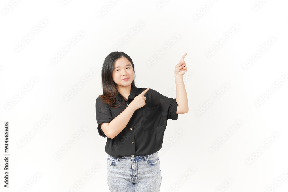 Young Asian woman presenting and pointing side copyspace wearing Black t-shirt and jeans isolated on white background Young Asian woman presenting and pointing side copyspace wearing Black t-shirt and jeans isolated on white background