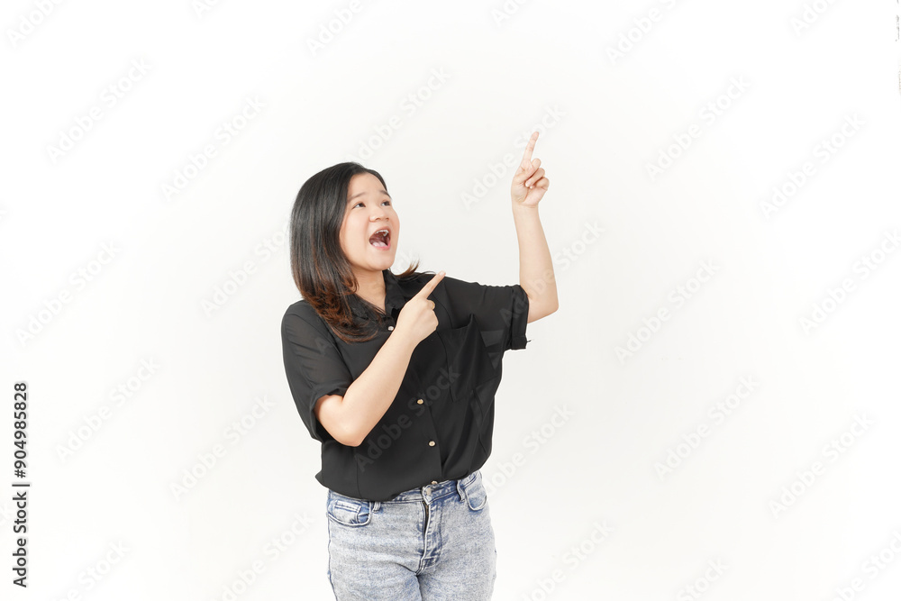Young Asian woman presenting and pointing side copyspace wearing Black t-shirt and jeans isolated on white background Young Asian woman presenting and pointing side copyspace wearing Black t-shirt and jeans isolated on white background