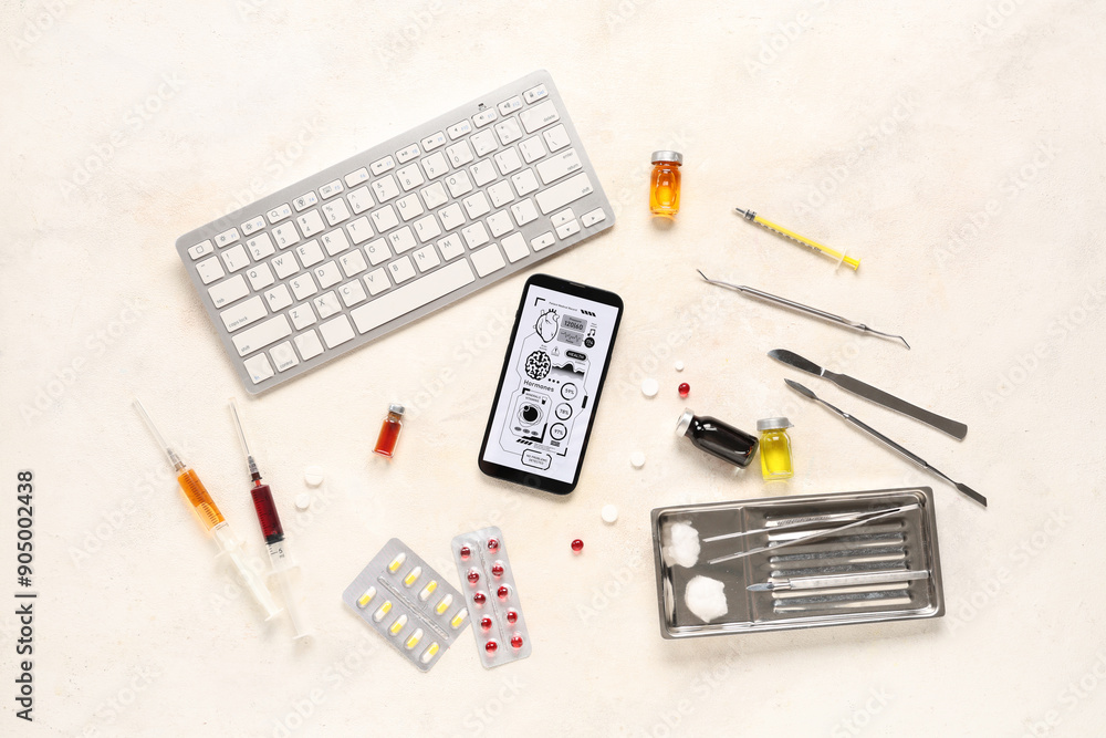 Mobile phone with computer keyboard and medical supplies on light background. Telemedicine concept Mobile phone with computer keyboard and medical supplies on light background. Telemedicine concept