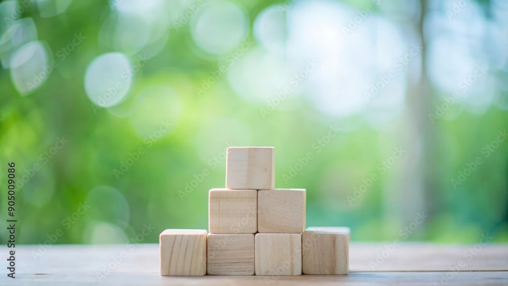 Rustic wooden blocks and gentle green background
Rustic wooden blocks and gentle green background