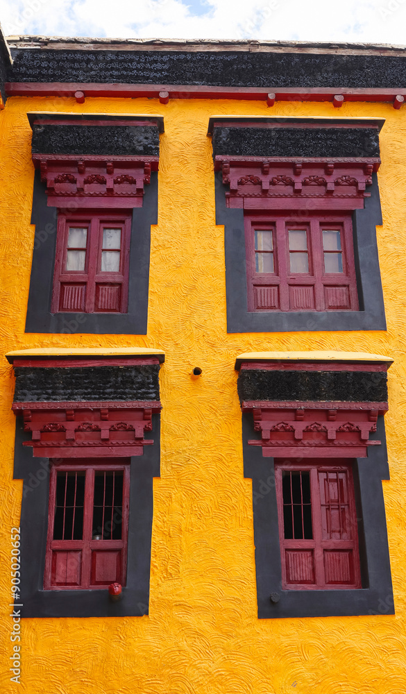 Fototapeta premium Wooden windows of Thiksey Monastery, Thiksey, Leh, Ladakh, India.