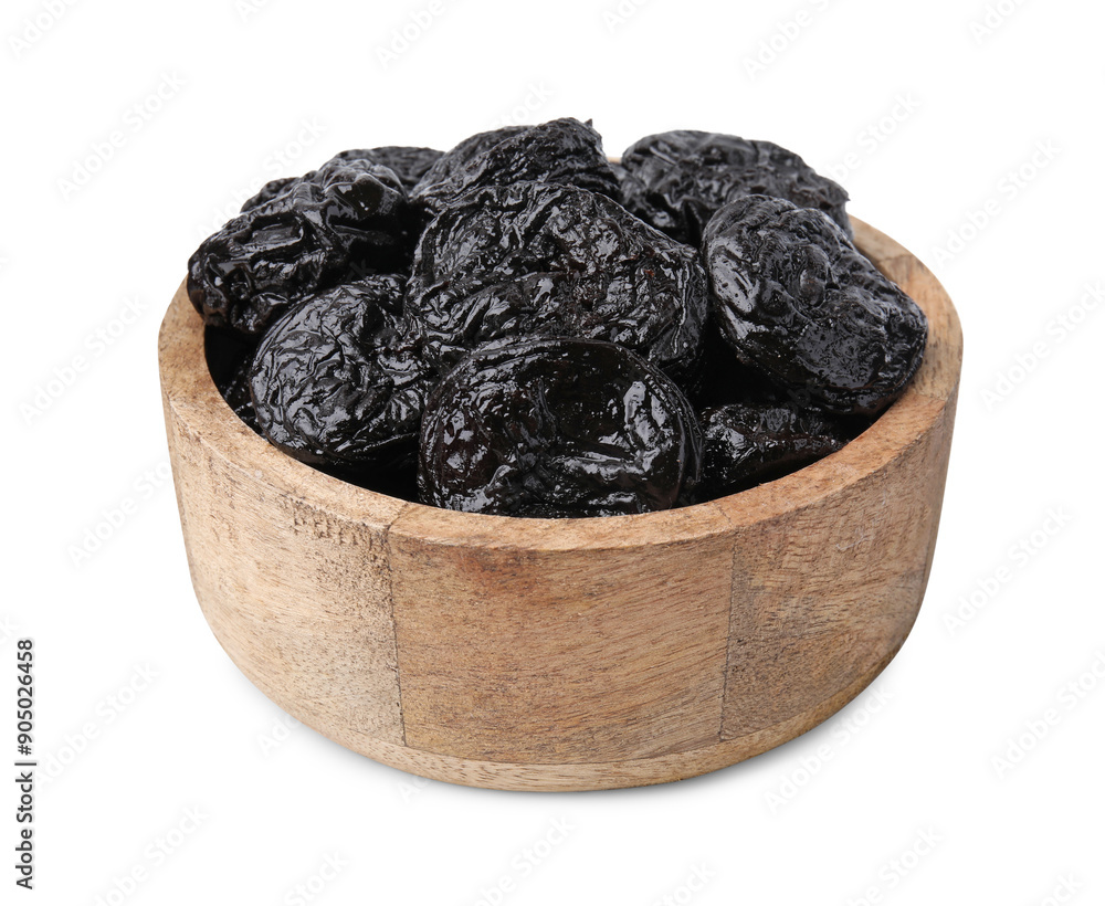 Tasty dried plums (prunes) in wooden bowl on white background Tasty dried plums (prunes) in wooden bowl on white background