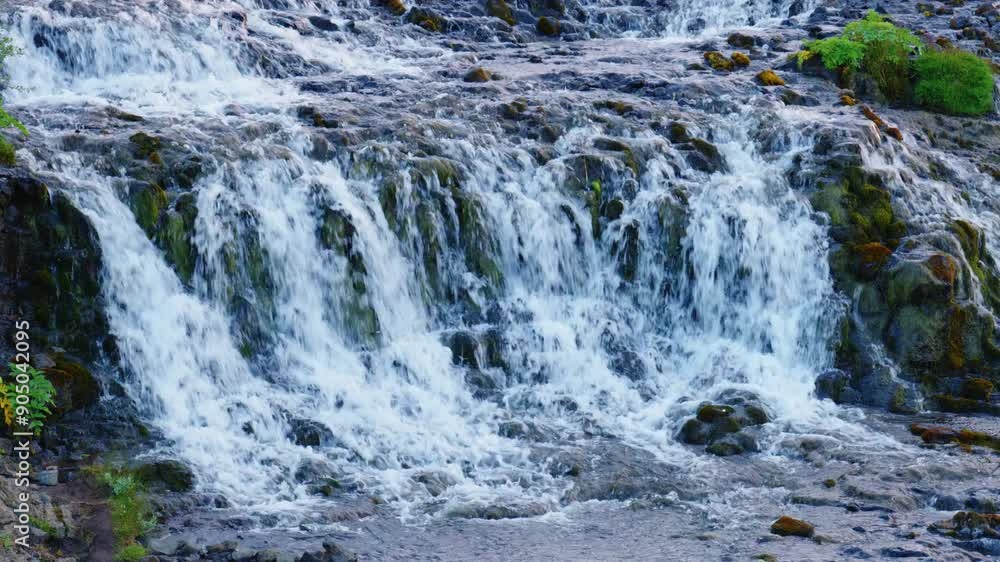 The Brúarfoss waterfall in Iceland. The Brúarfoss waterfall in Iceland.