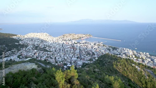 Aerial Pull back Shot of Kavala City Greece, Reveal Mountain, Panoramic Town View photo