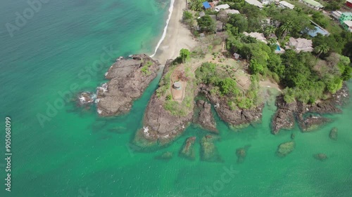 Magnificent aerial view showcasing Tobago's white sand and pristine beach in the Caribbean at Fort Bnnett photo