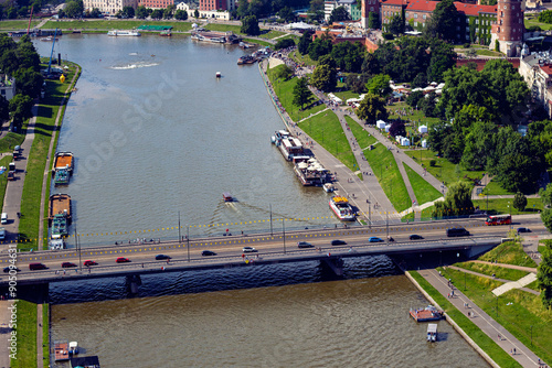 Grunwald Bridge (Polish: Most Grunwaldzki) over Vistula river leading to Wawel Royal Castle in Krakow, Poland. View from Balon Widokowy viewpoint, observation viewing platform on tethered balloon  photo