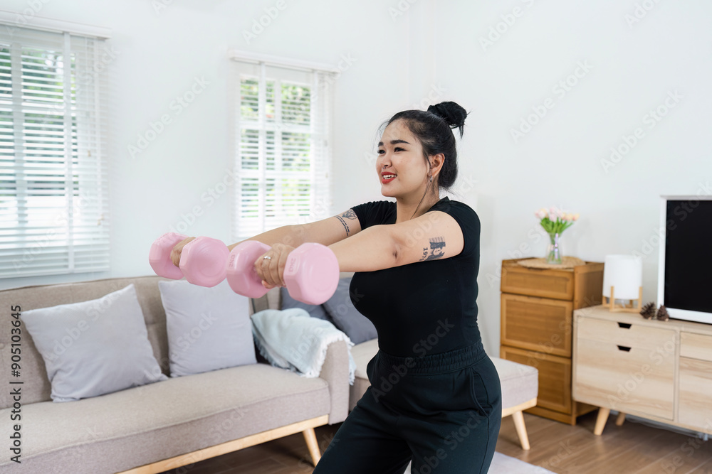 Woman Exercising with Dumbbells in a Modern Wellness Home Living Room with Natural Light and Minimalist Decor Woman Exercising with Dumbbells in a Modern Wellness Home Living Room with Natural Light and Minimalist Decor
